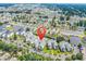 Scenic aerial view of the condominium complex surrounded by lush landscaping and waterways at 2020 Cross Gate Blvd. # 203, Surfside Beach, SC 29575