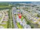Scenic aerial view of the condominium complex surrounded by lush landscaping and waterways at 2020 Cross Gate Blvd. # 203, Surfside Beach, SC 29575