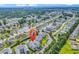 Scenic aerial view of the condominium complex surrounded by lush landscaping and waterways at 2020 Cross Gate Blvd. # 203, Surfside Beach, SC 29575