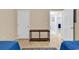 Bedroom with two twin beds and a wooden console table at 2020 Cross Gate Blvd. # 203, Surfside Beach, SC 29575