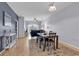 Bright living room with stylish furnishings seamlessly connected to the dining area at 2020 Cross Gate Blvd. # 203, Surfside Beach, SC 29575