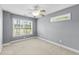 Simple bedroom with ceiling fan, carpeted floors, and base molding at 2077 N Berwick Dr., Myrtle Beach, SC 29575