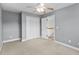This bedroom offers neutral walls, plush carpet, and a ceiling fan for ultimate comfort at 2077 N Berwick Dr., Myrtle Beach, SC 29575
