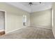 Bedroom with carpeted floors and base molding leads to a bathroom at 2077 N Berwick Dr., Myrtle Beach, SC 29575