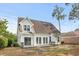 This is a charming two-story home featuring a spacious backyard and beautiful architectural details at 2077 N Berwick Dr., Myrtle Beach, SC 29575