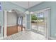 Eat-in kitchen with tile floors and views of living room and access to outdoor deck at 2077 N Berwick Dr., Myrtle Beach, SC 29575