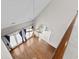 View of living room with ceiling fan and hardwood floors from upstairs at 2077 N Berwick Dr., Myrtle Beach, SC 29575