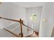Staircase landing features a chandelier and large window at 2077 N Berwick Dr., Myrtle Beach, SC 29575