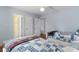 Bedroom featuring two beds with blue patchwork quilts and hardwood floors at 213 South Myrtle Dr., Surfside Beach, SC 29575