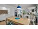 Bright dining area, featuring a wooden table, colorful chairs, with views into the living area at 223 Maison Dr. # B-8, Myrtle Beach, SC 29572