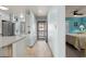Hallway connecting the kitchen, bedroom, and outdoor porch area at 223 Maison Dr. # B-8, Myrtle Beach, SC 29572