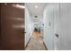 Inviting hallway leading into the home, featuring tile floors and light blue painted walls at 223 Maison Dr. # B-8, Myrtle Beach, SC 29572