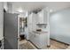 Bright kitchen featuring white cabinets, granite countertops, and modern appliances at 223 Maison Dr. # B-8, Myrtle Beach, SC 29572
