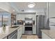 Kitchen showcasing granite countertops, stainless steel appliances, and ample cabinet space at 223 Maison Dr. # B-8, Myrtle Beach, SC 29572