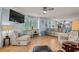 Spacious living room with lots of natural light, comfortable seating, and an open floor plan at 223 Maison Dr. # B-8, Myrtle Beach, SC 29572
