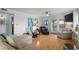 Bright living room featuring hardwood floors, a ceiling fan, neutral paint, and comfortable furniture at 223 Maison Dr. # B-8, Myrtle Beach, SC 29572
