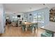 Open-concept living and dining area featuring modern furnishings and lots of natural light at 223 Maison Dr. # B-8, Myrtle Beach, SC 29572