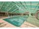 Indoor pool area, perfect for year-round enjoyment with plenty of lounge seating and a bright, airy atmosphere at 223 Maison Dr. # B-8, Myrtle Beach, SC 29572