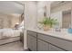 Bathroom with double sinks and vanity, adjacent to bedroom, offering convenience and style at 226 Carver Willow Dr., Loris, SC 29569