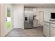 Bright kitchen with stainless steel appliances and access to the backyard with lots of sunlight at 226 Carver Willow Dr., Loris, SC 29569
