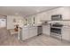 Modern kitchen equipped with stainless steel appliances, granite countertops and ample cabinet space at 226 Carver Willow Dr., Loris, SC 29569