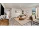 Bright living room featuring stylish furniture, modern décor, and ample natural light at 226 Carver Willow Dr., Loris, SC 29569