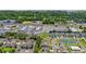 Sprawling residential area with lush trees and blue houses near the ocean, perfect for families looking for a cozy escape at 229 Coral Beach Circle, Surfside Beach, SC 29575