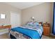 Comfortable bedroom featuring a closet, a wooden bed frame with side tables at 229 Coral Beach Circle, Surfside Beach, SC 29575