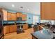 Modern kitchen with granite countertops, stainless steel appliances, and ample cabinet space at 229 Coral Beach Circle, Surfside Beach, SC 29575