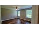 Bright bedroom features two windows, ceiling fan, and attractive flooring at 2407 James St. # 401, Conway, SC 29527
