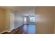 Bright living room with wood-look floors, neutral walls, and front door at 2407 James St. # 401, Conway, SC 29527