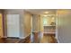 Inviting living room boasts wood-look floors, neutral paint, and opens to kitchen at 2407 James St. # 401, Conway, SC 29527