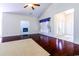 Spacious living room with fireplace, and entry to front door at 2499 Burning Tree Ln., Little River, SC 29566