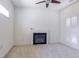 Cozy living room with a fireplace, neutral carpet, and bright white walls at 2499 Burning Tree Ln., Little River, SC 29566
