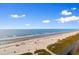 Picturesque beach view with blue sky, ocean, and sandy beach landscape at 2609 South Ocean Blvd. # 702, North Myrtle Beach, SC 29582