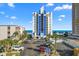 Exterior of building with parking and landscaping at 2609 South Ocean Blvd. # 702, North Myrtle Beach, SC 29582