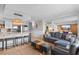 Open concept floor plan with a view of the kitchen from the living room, modern furniture, and stylish decor at 2609 South Ocean Blvd. # 702, North Myrtle Beach, SC 29582