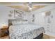 Comfortable main bedroom with ceiling fan, large bed, and built-in closet system at 2609 South Ocean Blvd. # 702, North Myrtle Beach, SC 29582