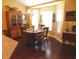 Cozy breakfast nook filled with natural light, complemented by a charming chandelier at 266 Tall Palms Way, Little River, SC 29566