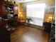 Office with a built-in bookcase, desk, and a large window at 266 Tall Palms Way, Little River, SC 29566
