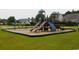 Community playground featuring slides and climbing structures for outdoor fun at 266 Tall Palms Way, Little River, SC 29566