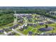 Residential neighborhood featuring manicured lawns, sidewalks, and a serene pond at 282 Foxpath Loop, Myrtle Beach, SC 29588
