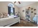 Bedroom featuring hardwood floors, and a large window at 282 Foxpath Loop, Myrtle Beach, SC 29588