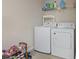 Functional laundry room featuring a modern washing machine and dryer, ready for everyday convenience at 282 Foxpath Loop, Myrtle Beach, SC 29588