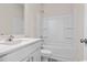 Bright bathroom features a combination tub and shower, vanity with sink, and modern fixtures at 3027 Deerberry Place, Longs, SC 29568
