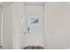 Inviting entryway features a front door with glass panel allowing natural light at 3027 Deerberry Place, Longs, SC 29568