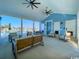 Relaxing outdoor seating area with fans overlooking community pool at 3027 Deerberry Place, Longs, SC 29568