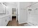 Bathroom featuring double sinks, a glass shower and modern fixtures at 305 Portofino Dr., Myrtle Beach, SC 29579