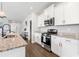Modern kitchen featuring granite countertops and stainless steel appliances at 305 Portofino Dr., Myrtle Beach, SC 29579