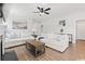 Bright living room with modern ceiling fan, plush sofas and neutral tones at 305 Portofino Dr., Myrtle Beach, SC 29579